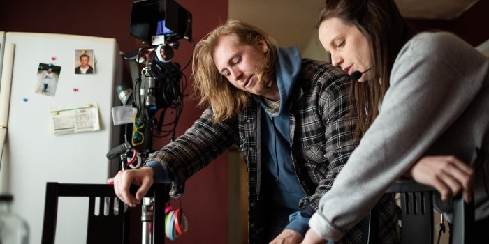 Taylor Olson (left) on set as he directs and stars in the film adaptation of Catherine Banks' Governor General's Literary Award-winning play Bone Cage.